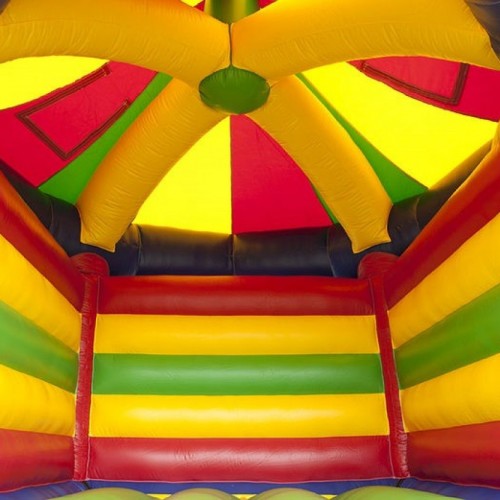 Springkussen Carrousel met glijbaan
